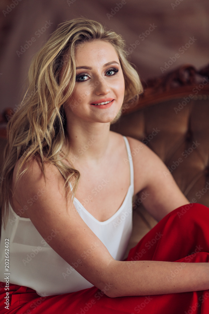 Portrait of beautiful young woman with makeup in fashion clothes Portrait of beautiful young woman with makeup in fashion clothes
