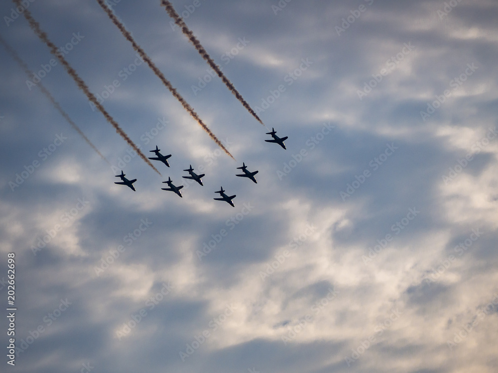 Airplanes in formation during an airshow Airplanes in formation during an airshow