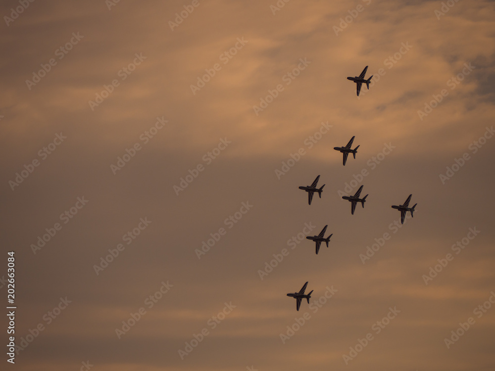Airplanes in formation during an airshow