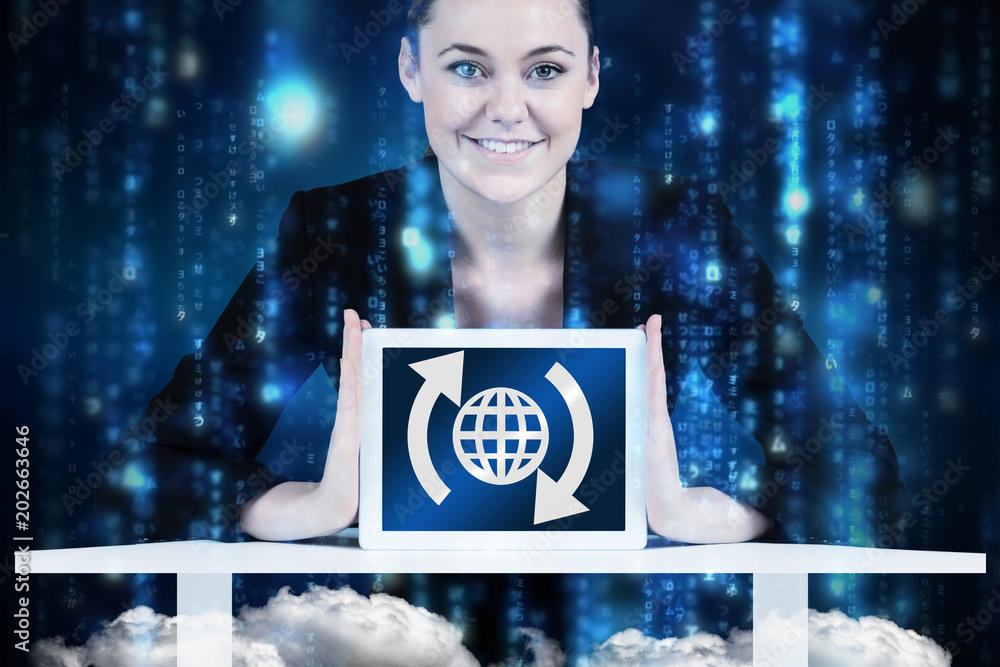 Φωτογραφία Businesswoman sitting at desk showing tablet against lines of blue blurred lette