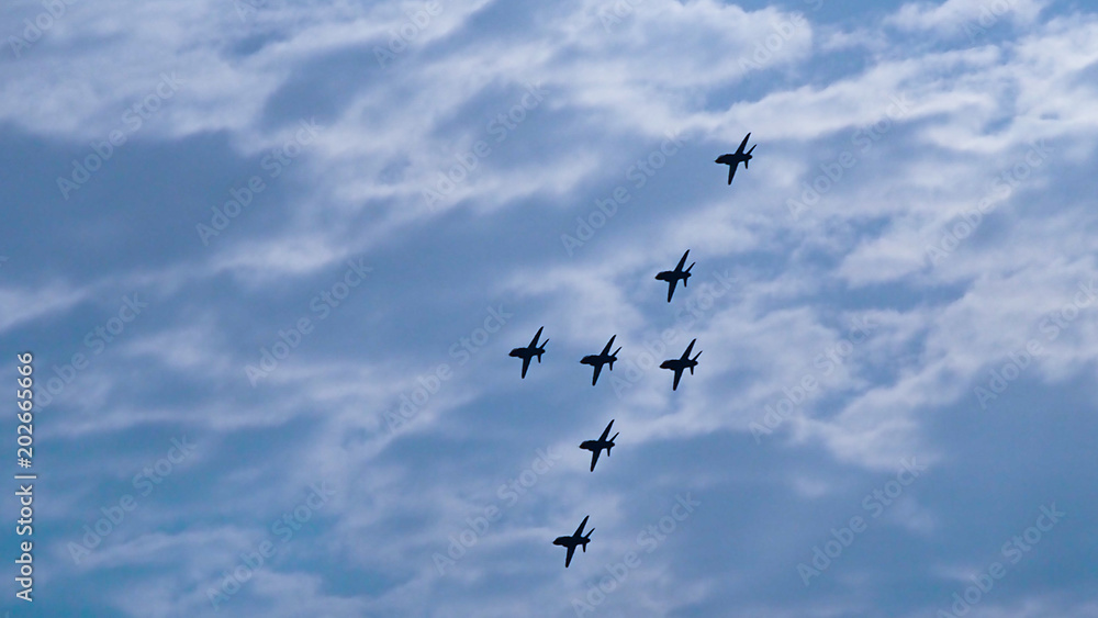 Airplanes in formation during an airshow