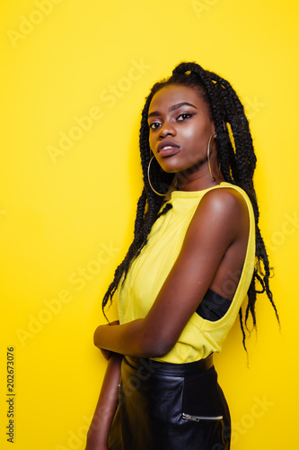 Portrait of young woman with dreadlocks photo
