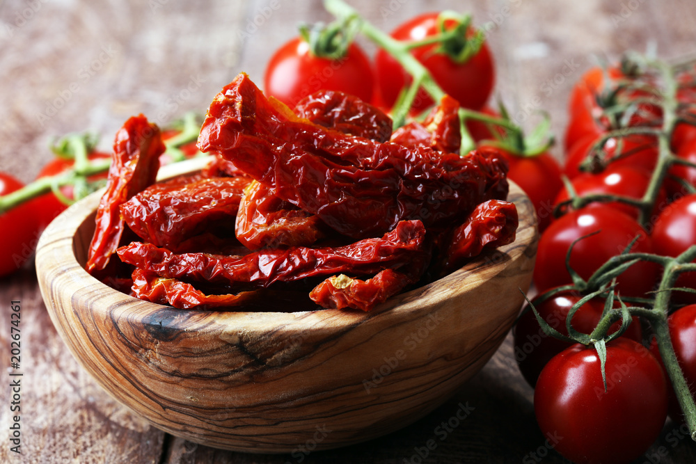 Sun dried tomatoes. tomato halves sun-dried. Sun dried tomatoes. tomato halves sun-dried.