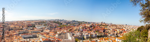 Old Lisbon Portugal panorama. cityscape with roofs. Tagus river. miraduro viewpoint. View from sao jorge castle