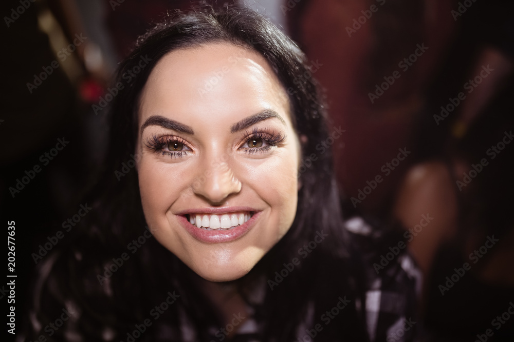 portrait of happy woman at nightclub portrait of happy woman at nightclub