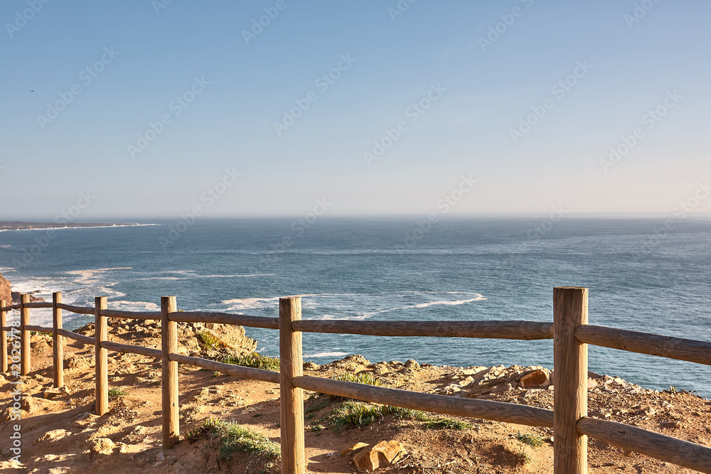 Exploring Portugal. Cabo da Roca ocean and mountains view landscape, authentic capture, wanderlust concept. Exploring Portugal. Cabo da Roca ocean and mountains view landscape, authentic capture, wanderlust concept.