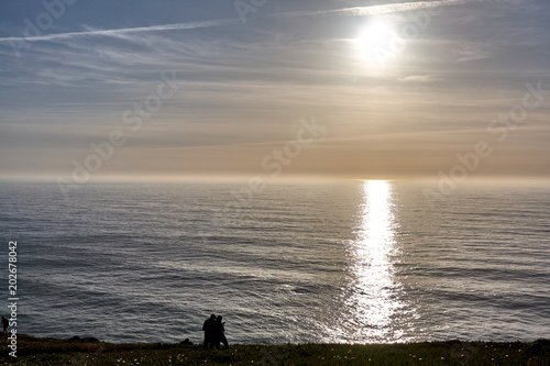 Exploring Portugal. Cabo da Roca ocean and mountains view landscape  authentic capture  wanderlust concept. sunset silhouettes