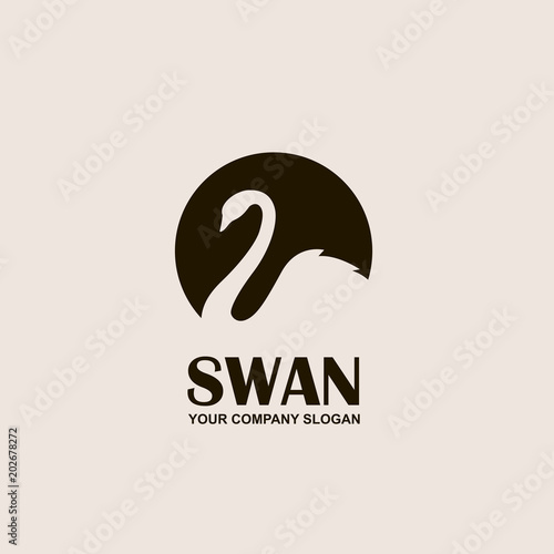 abstract emblem with swan in black circle