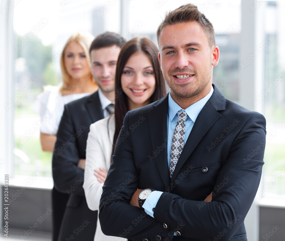 closeup. leader standing in front of the business team closeup. leader standing in front of the business team