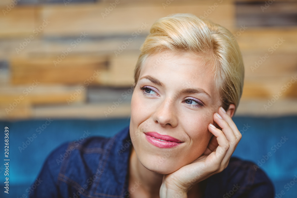 Thoughtful pretty blonde looking away Thoughtful pretty blonde looking away