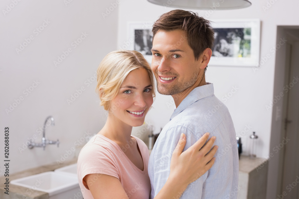 Smiling young couple embracing Smiling young couple embracing