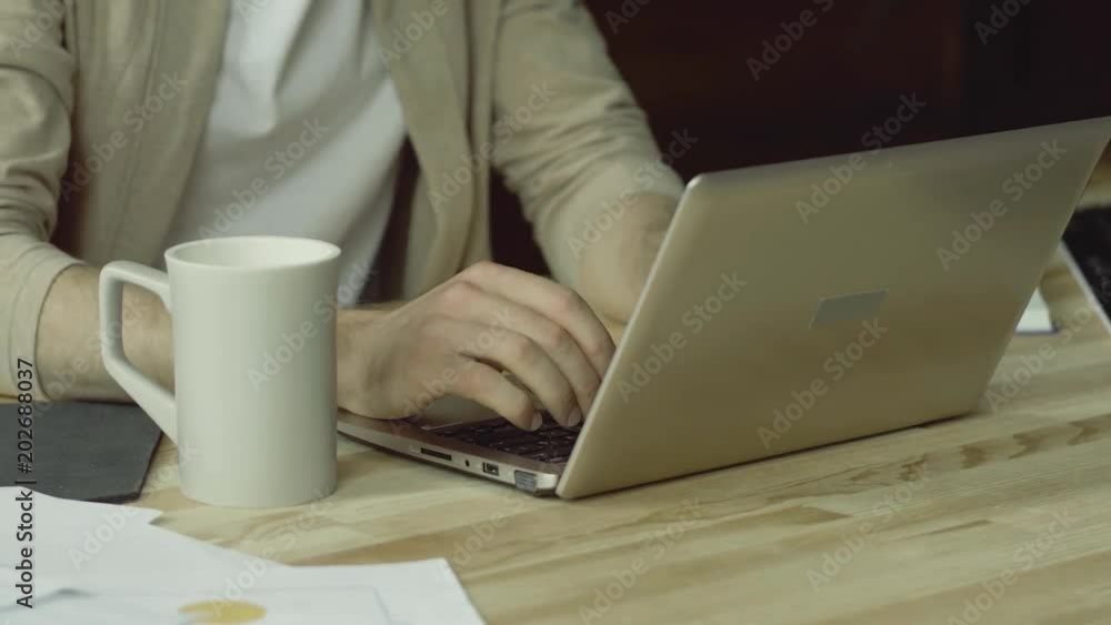 Close up portrait of man hands typing on laptop. Freelance home office. Making project. Close up portrait of man hands typing on laptop. Freelance home office. Making project.