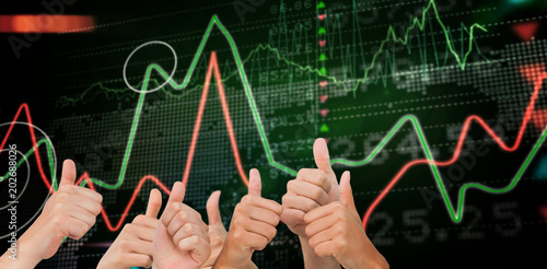 Hands giving thumbs up against stocks and shares on black background