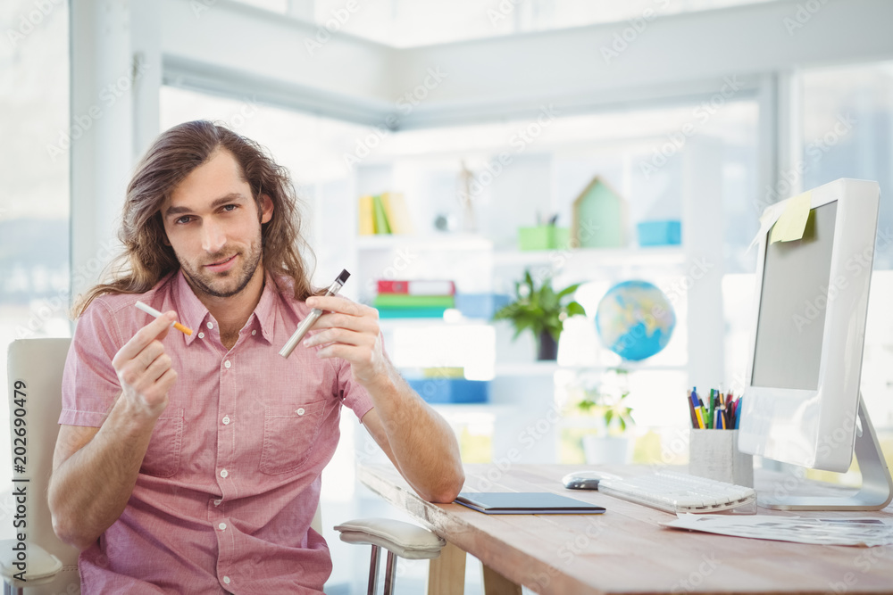 Portrait of hipster holding cigarettes Portrait of hipster holding cigarettes