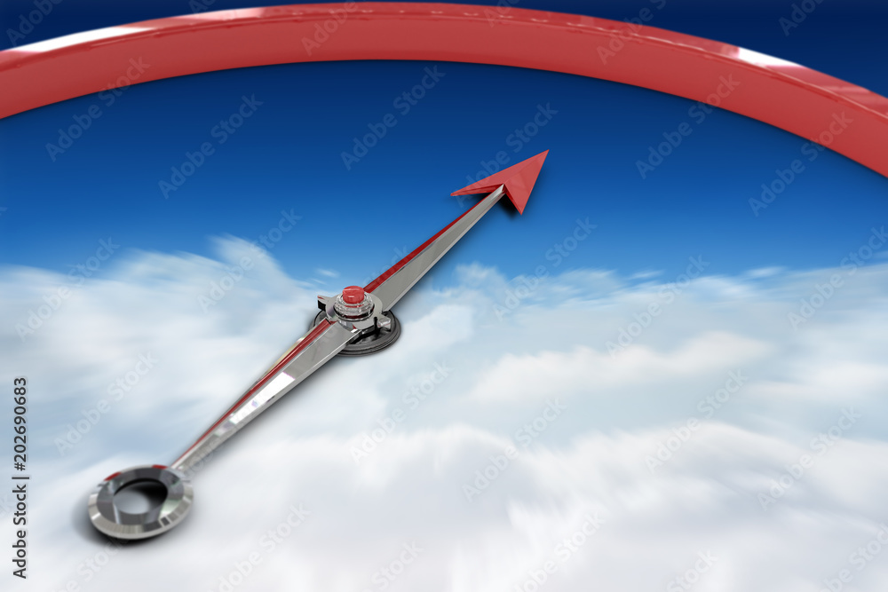 Compass against bright blue sky over clouds Compass against bright blue sky over clouds