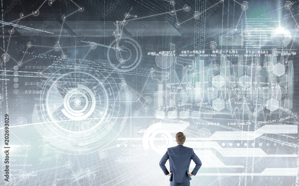 Wear view of businessman with hands on hip against hologram background Wear view of businessman with hands on hip against hologram background