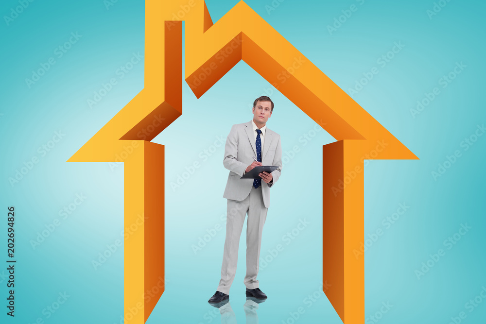 Businessman writing on clipboard against blue vignette Businessman writing on clipboard against blue vignette