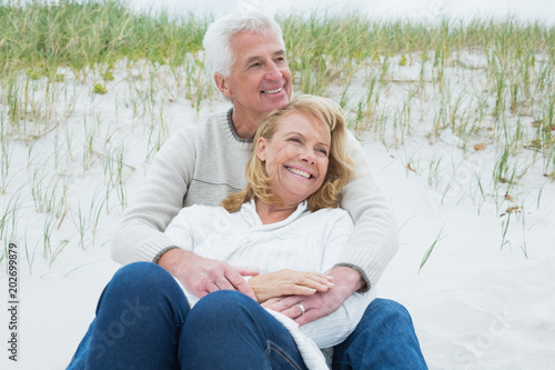 Romantic senior couple relaxing at beach © WavebreakmediaMicro