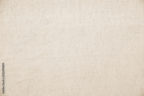 Textures of natural linen and cotton fabric beige for the background 