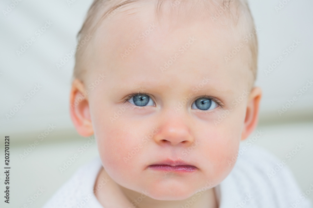 Close up of a baby looking at camera