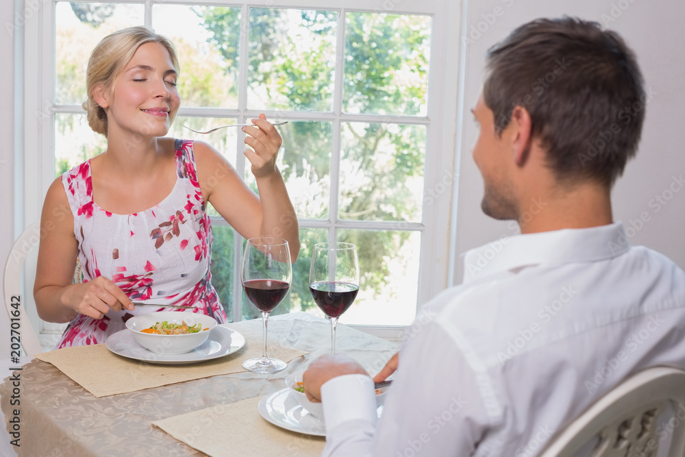 Happy couple enjoying food Happy couple enjoying food