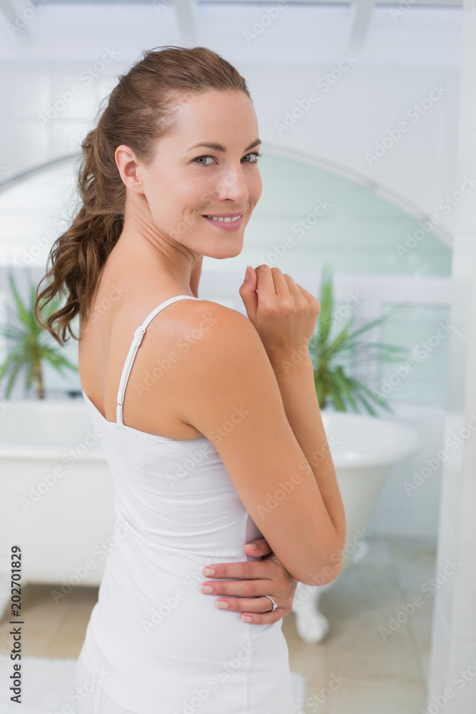 Portrait of a beautiful young woman in bathroom Portrait of a beautiful young woman in bathroom