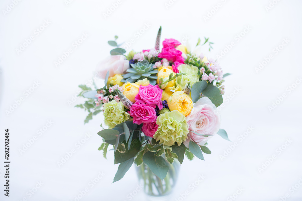 Naklejka premium Lovely spring colorful bouquet in a vase