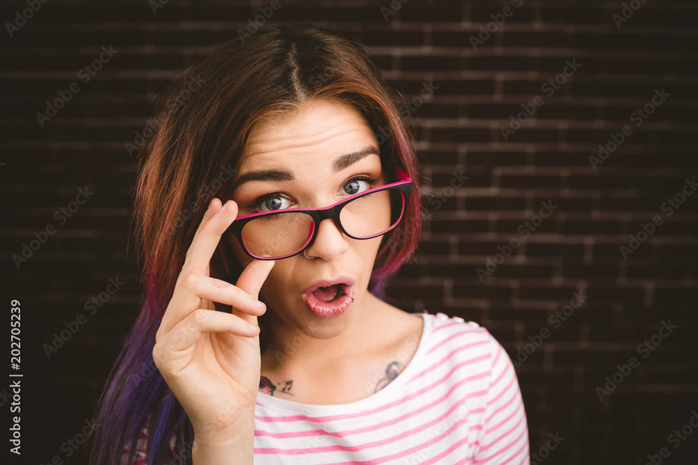 Portrait of smiling woman holding spectacles Portrait of smiling woman holding spectacles