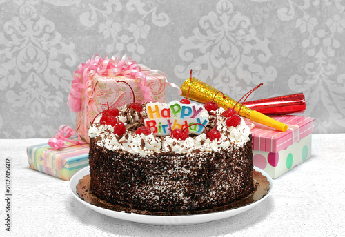 Happy Birthday Black Forest Chocolate Cake with gifts.