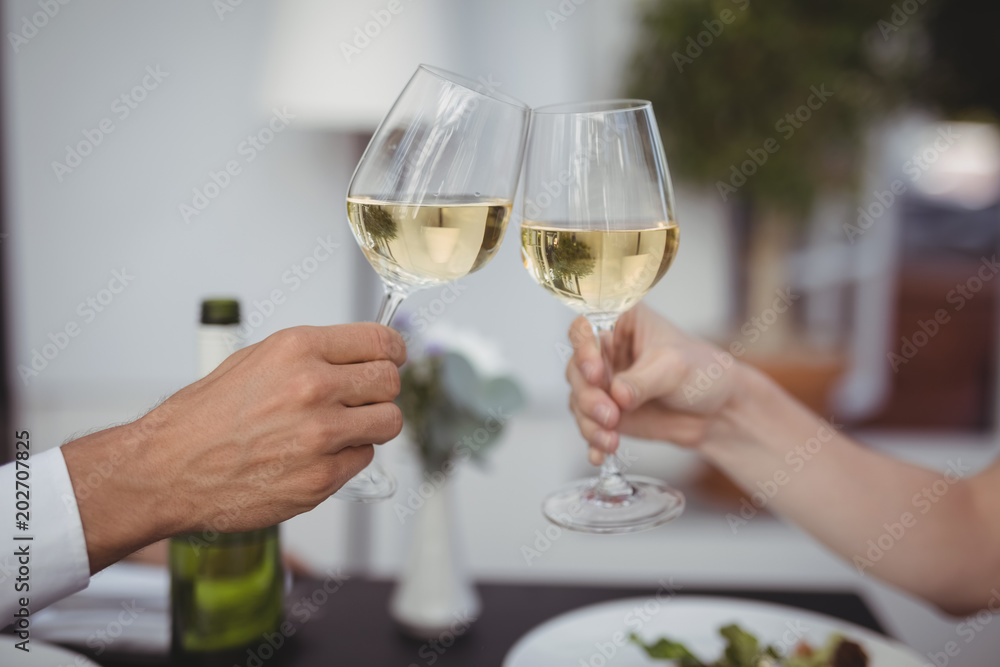 Couple toasting wine glasses Couple toasting wine glasses