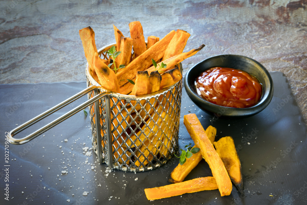 Φωτογραφία Sweet Potato Fries in Metal Basket with Ketchup