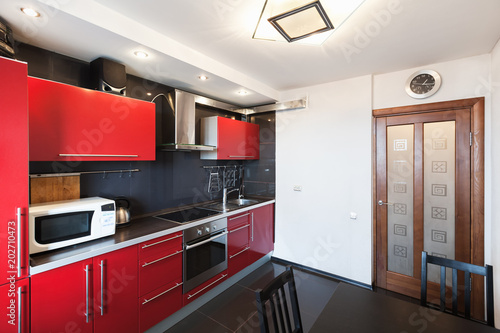Kitchen interior. Black, red and white design
