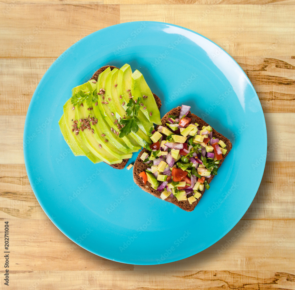 sandwiches with avocado in a plate sandwiches with avocado in a plate