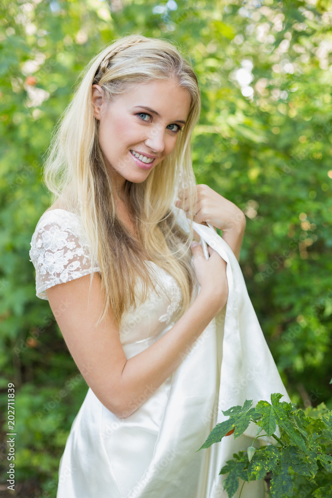 Smiling beautiful bride looking at camera Smiling beautiful bride looking at camera