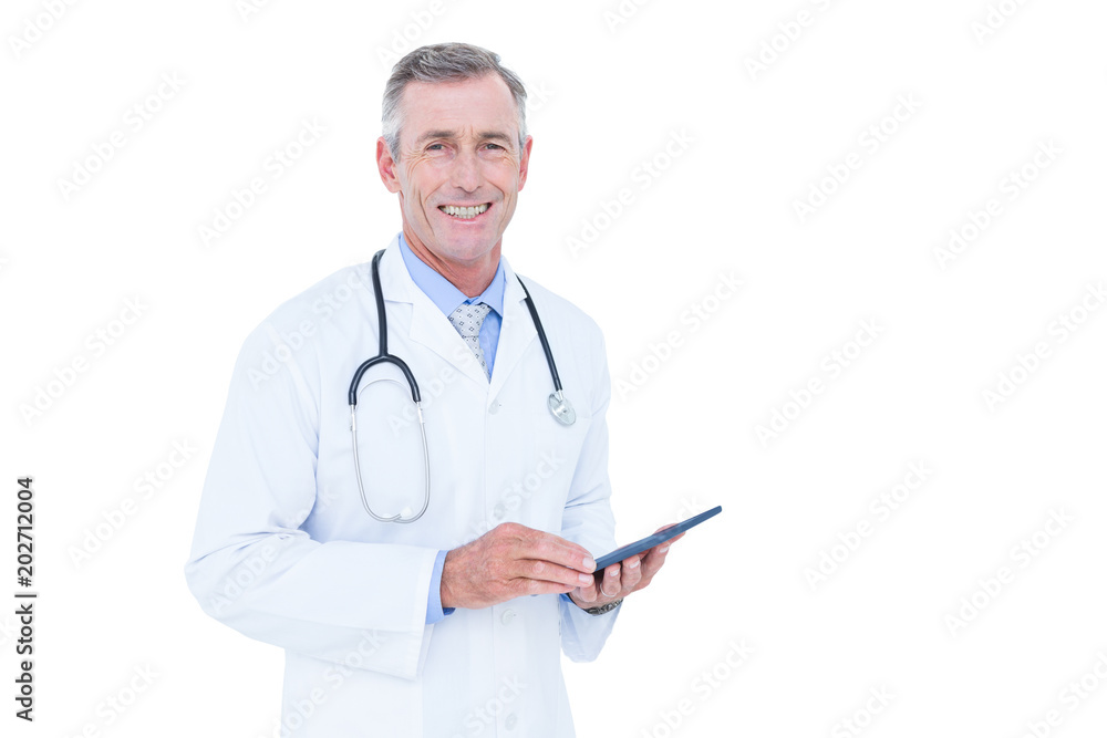 Image of doctor standing with tablet pc Image of doctor standing with tablet pc