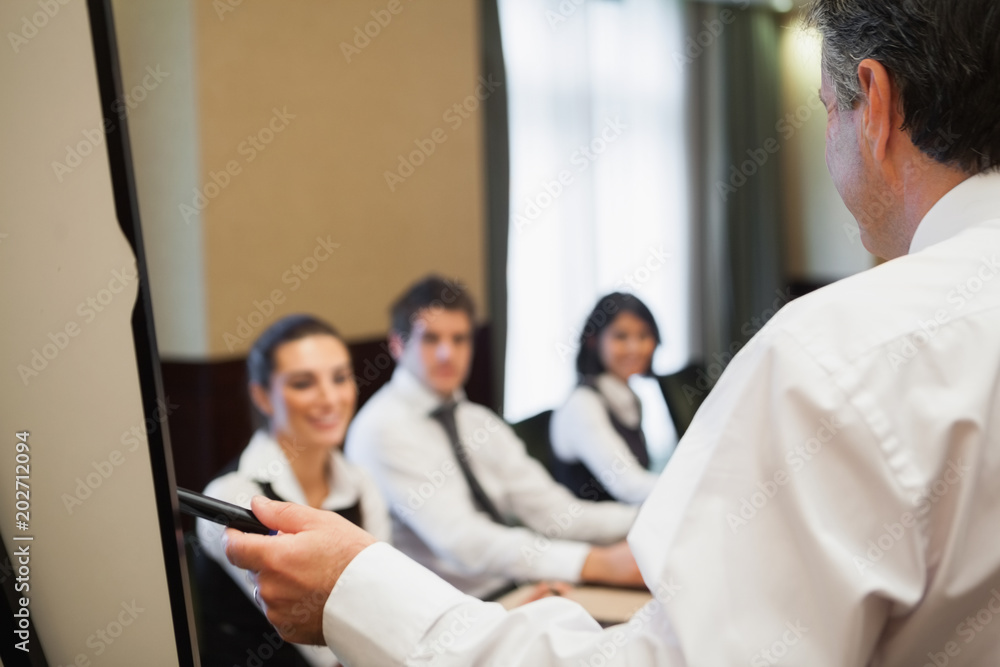 Man giving a business presentation Man giving a business presentation