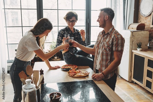 Sticker Friends clinking glasses with wine and eating pizza at home part