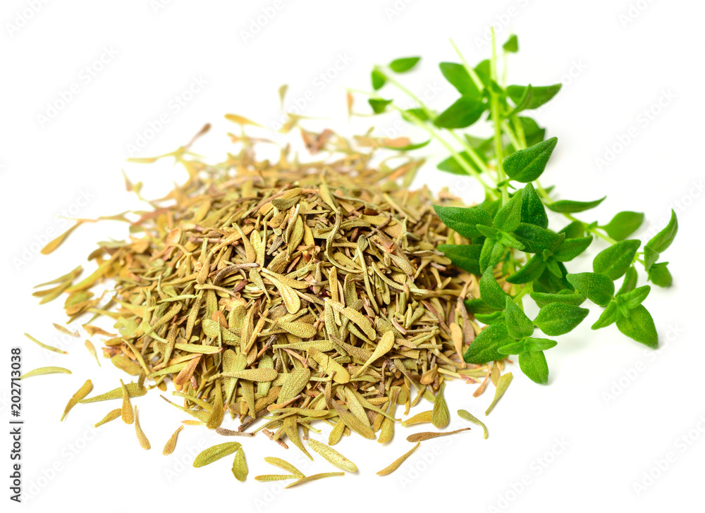 dried thyme leaves with fresh thyme isolated on white dried thyme leaves with fresh thyme isolated on white
