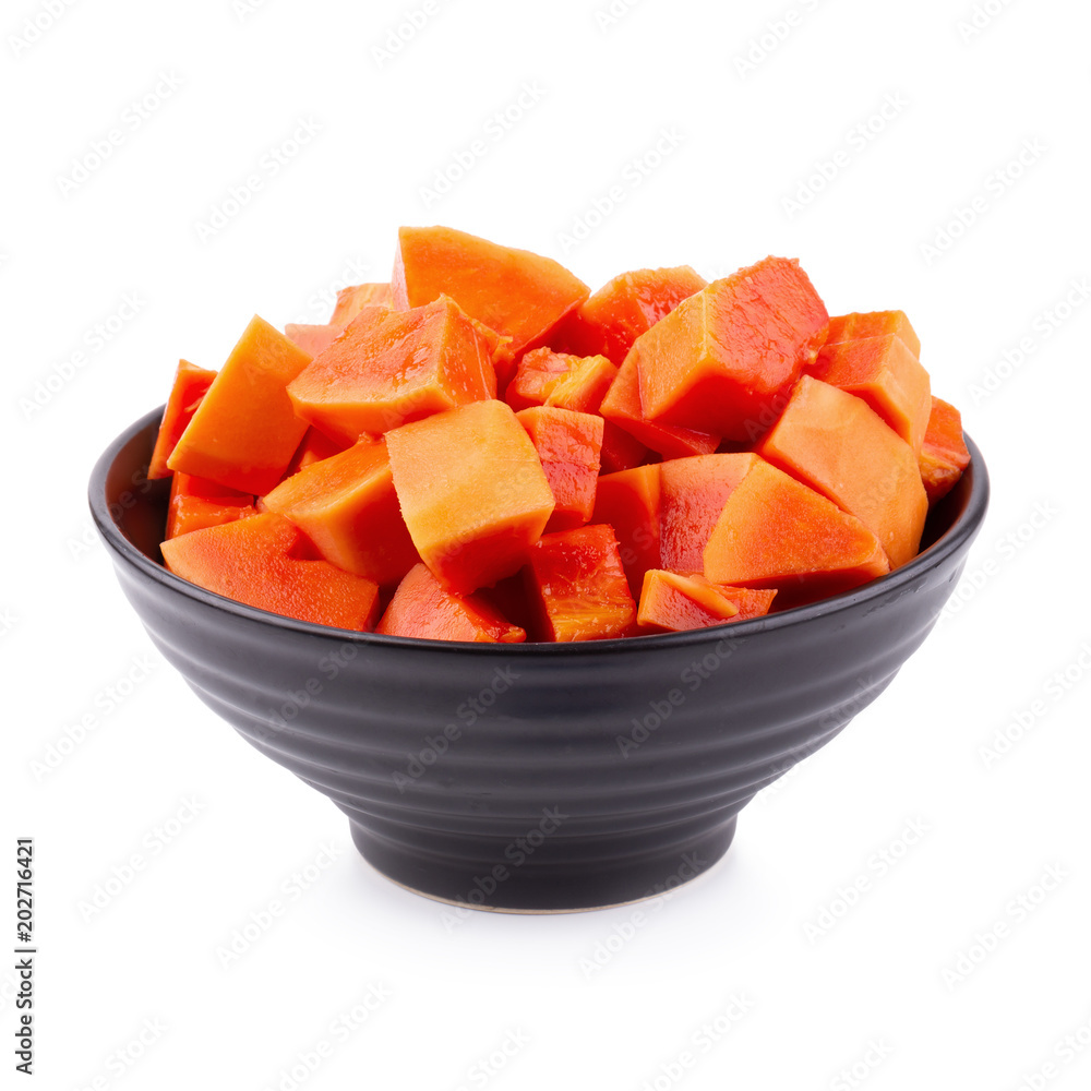 Cut into pieces of ripe papaya fruit isolated on white background