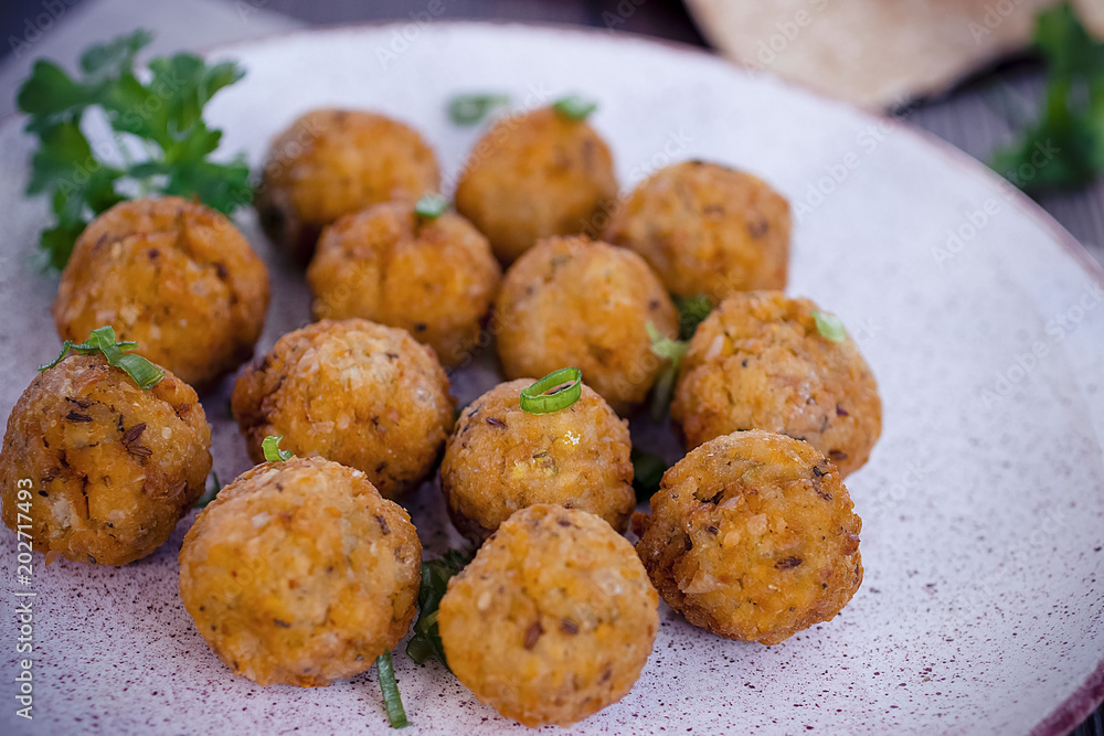 Traditional jewish and middle eastern dish. Falafel. Israeli cuisine concept. Traditional jewish and middle eastern dish. Falafel. Israeli cuisine concept.