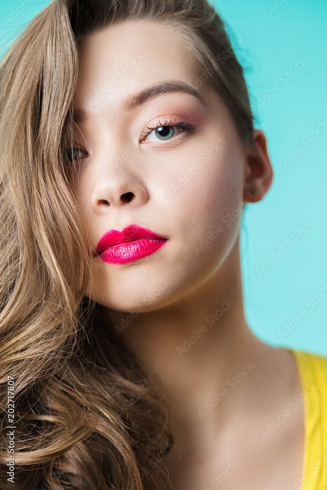 Close up portrait of a beautiful woman looking at camera Close up portrait of a beautiful woman looking at camera