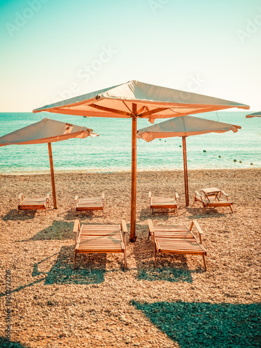 Sun umbrellas and beach beds