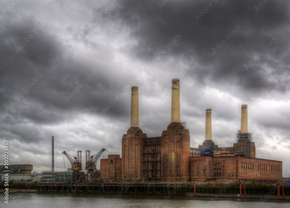 Battersea power station against dark stormy sky before local develoments changing the iconic skyline