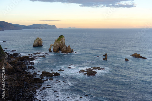 Rocky coastline of Atlantic ocean near San juan de Gaztelugatxe. Basque Country, Spain photo