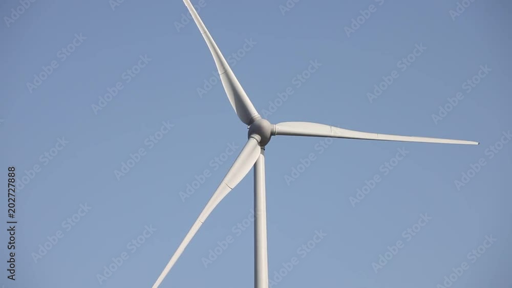 Wind turbines create renewable energy. Ecology and environment concept. Wind turbines create renewable energy. Ecology and environment concept.