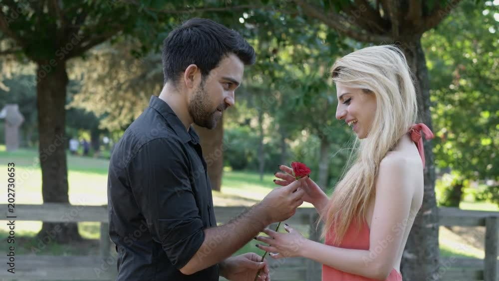 romance, love, marriage proposal - young man makes a declaration to his woman romance, love, marriage proposal - young man makes a declaration to his woman