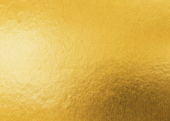 Gold texture background metallic golden foil or shinny wrapping paper bright yellow wall paper for design decoration element