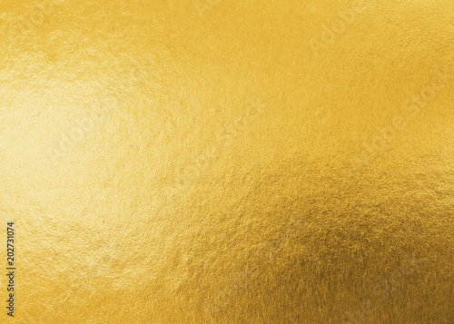 Gold texture background metallic golden foil or shinny wrapping paper bright yellow wall paper for design decoration element