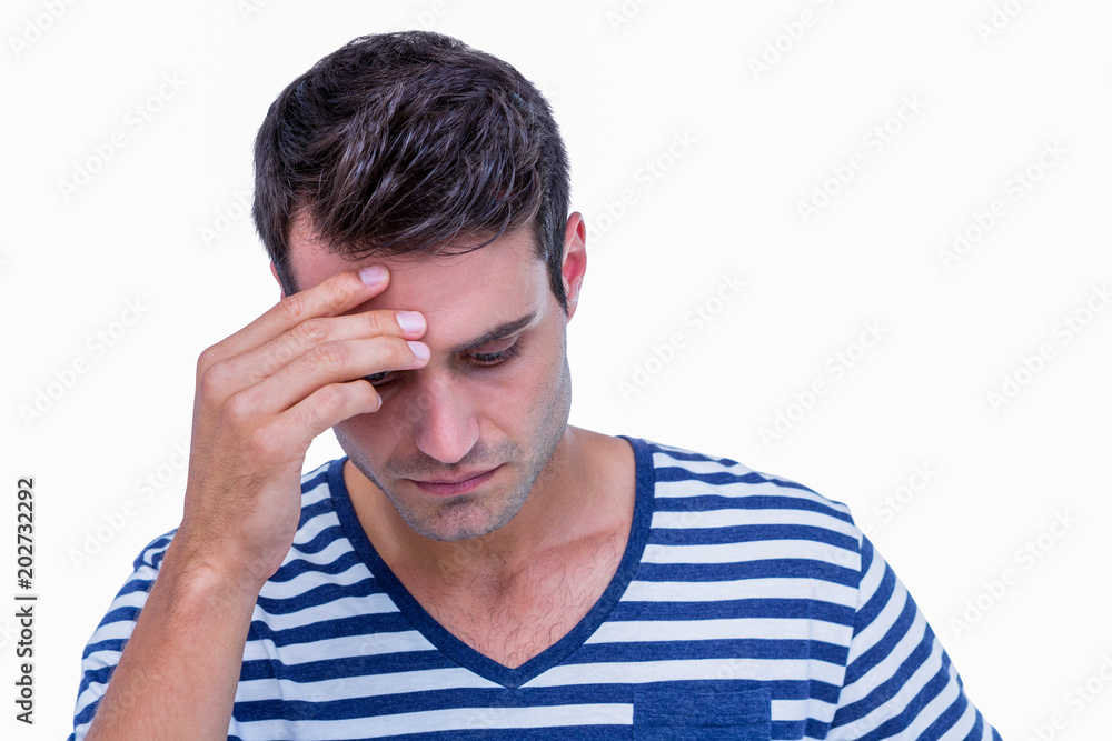 Close up of sad hipster with one hand on head Close up of sad hipster with one hand on head