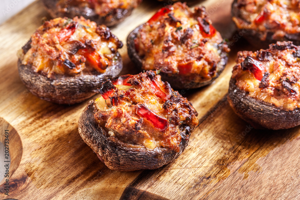 Baked champignon caps stuffed with minced meat Baked champignon caps stuffed with minced meat
